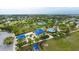 Aerial view of a community park featuring a playground, gazebo, and recreational areas at 4691 Claremont Park Dr, Bradenton, FL 34211