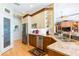 Updated kitchen featuring stainless steel appliances, granite counters, and ample storage at 4740 Carrington Cir, Sarasota, FL 34243