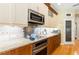 Modern kitchen with stainless steel appliances and sleek countertops at 4740 Carrington Cir, Sarasota, FL 34243