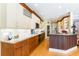 Well-equipped kitchen with granite countertops, stainless steel appliances, and custom cabinetry at 4740 Carrington Cir, Sarasota, FL 34243