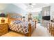 Spacious main bedroom with a decorative ceiling, large windows, and plush carpeting that provides comfort and style at 4740 Carrington Cir, Sarasota, FL 34243