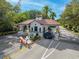 Charming entrance to The Landings community, decorated with festive Halloween decor at 4852 Peregrine Point N Cir, Sarasota, FL 34231