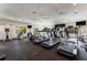 Well-equipped fitness center with treadmills, weights, and various exercise machines at 4852 Peregrine Point N Cir, Sarasota, FL 34231