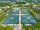 An overhead shot of the many tennis courts at The Landings community at 4852 Peregrine Point N Cir, Sarasota, FL 34231