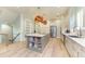 Well lit kitchen with an island and quartz countertops. Stainless steel appliances can also be seen at 516 Kumquat Dr, Anna Maria, FL 34216