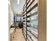 Spacious walk-in closet featuring an abundance of shelving at 516 Kumquat Dr, Anna Maria, FL 34216