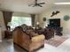 Comfortable living room with furniture, tile floors, and natural light at 5180 Guava Ter, Port Charlotte, FL 33981