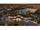 Gorgeous aerial view of the community center, pool, lake, tennis courts, and homes at Mattamy Homes at Tradition at 5557 Long Shore Loop, Sarasota, FL 34238