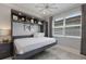 Versatile room featuring a Murphy bed, built-in storage, neutral colors, and natural light for flexible living at 5557 Long Shore Loop, Sarasota, FL 34238