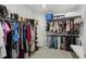 Spacious walk-in closet with ample storage for clothing and accessories at 5557 Long Shore Loop, Sarasota, FL 34238