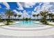 Bask in the Florida sunshine at this beautiful community pool, complete with lounge chairs and swaying palm trees at 5557 Long Shore Loop, Sarasota, FL 34238
