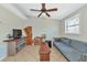 Modern living room featuring artistic wood decor and contemporary furniture at 5860 Brown Ln, Sarasota, FL 34232