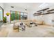 Bright living room showcases contemporary decor, a plush sectional sofa, and large windows at 587 47Th St, Sarasota, FL 34234