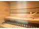 Home sauna featuring wood construction and a wooden bucket and ladle at 587 47Th St, Sarasota, FL 34234