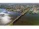 Aerial view showcasing the property's location on the water, adjacent to a walking path at 603 Frances St, Nokomis, FL 34275