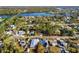Scenic aerial view of the homes in a lush community near a river, creating a serene and picturesque neighborhood at 603 Frances St, Nokomis, FL 34275