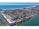 Stunning aerial view of beachside condos, showcasing the community and ocean access at 6285 Midnight Pass Rd # 201, Sarasota, FL 34242