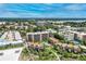 Coastal aerial view of property near the beach, showcasing community amenities and landscaped grounds at 6342 Midnight Pass Rd # 212, Sarasota, FL 34242
