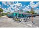 Quaint bike, kayak and paddleboard retail store with outdoor displays and parking at 6342 Midnight Pass Rd # 212, Sarasota, FL 34242