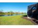 Tranquil pond view providing a peaceful backyard and relaxing view from the home at 6638 Willowshire Way, Bradenton, FL 34212