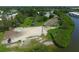 Aerial view shows community park area and boat storage with waterfront access and recreation at 6731 Northampton Pl, Bradenton, FL 34207
