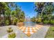 Landscaped backyard features a stock tank pool, patio, and a gravel border at 6731 Northampton Pl, Bradenton, FL 34207