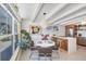 Bright dining area features a round table, natural lighting, and an open floor plan into the kitchen at 6731 Northampton Pl, Bradenton, FL 34207