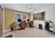 Home office with two desks, artwork, and vintage cabinet at 6731 Northampton Pl, Bradenton, FL 34207