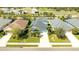 Aerial view of property showcasing roof, backyard, and surrounding neighborhood in a residential area at 7012 White Willow Ct, Sarasota, FL 34243