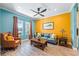 Inviting living room with colorful accents, comfortable furniture, and a stylish decor at 7012 White Willow Ct, Sarasota, FL 34243
