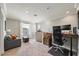 Sitting area and office space with comfortable seating and a modern desk setup at 7012 White Willow Ct, Sarasota, FL 34243