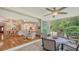 Relaxing screened lanai with a view of the living area and dining room at 7133 Victoria Cir, University Park, FL 34201