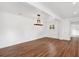 Spacious living room with hardwood flooring and natural light at 730 Rellim Ln, Sarasota, FL 34232