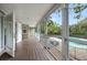Covered patio with pool view, perfect for outdoor relaxation at 730 Rellim Ln, Sarasota, FL 34232