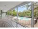 Spacious screened-in patio overlooking the pool and backyard at 730 Rellim Ln, Sarasota, FL 34232