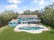 Aerial view of backyard with a large pool and a spacious patio great for entertaining at 7330 Westmoreland Dr, Sarasota, FL 34243