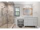 Elegant bathroom with a glass-enclosed shower and modern vanity at 7330 Westmoreland Dr, Sarasota, FL 34243