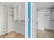 Walk-in closet with custom shelving and ample storage, ensuring your wardrobe stays neat and organized at 7330 Westmoreland Dr, Sarasota, FL 34243