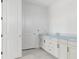 Bathroom featuring white cabinetry and modern fixtures, offering a clean and stylish space at 7561 Nighthawk Dr, Sarasota, FL 34241