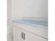 Bathroom showcasing white vanity with sleek hardware, and a clean, modern design at 7561 Nighthawk Dr, Sarasota, FL 34241
