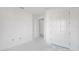 Bedroom boasting generous space, complemented by a closet and a doorway at 7561 Nighthawk Dr, Sarasota, FL 34241