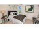 Cozy bedroom with a queen-sized bed, stylish decor, and a serene atmosphere, perfect for relaxation at 7561 Nighthawk Dr, Sarasota, FL 34241