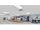 A large community room with stage and sitting area, perfect for gatherings and events at 772 Imperial Dr, North Port, FL 34287