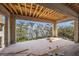 Unfinished patio offering panoramic views of the lush scenery and waterfront at 821 S Bay Blvd, Anna Maria, FL 34216