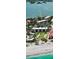 Birds-eye view showcasing condos near a beach, pool, and recreation area at 8625 Midnight Pass Rd # 305B, Sarasota, FL 34242