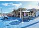 Exterior view of a seafood restaurant with outdoor seating, blue ground, and nautical decorations at 8625 Midnight Pass Rd # 305B, Sarasota, FL 34242