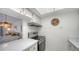 This kitchen includes updated appliances and plenty of counter space for meal prep at 8625 Midnight Pass Rd # 305B, Siesta Key, FL 34242