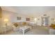 Inviting living room with comfortable seating and an open floor plan at 8625 Midnight Pass Rd # 305B, Sarasota, FL 34242
