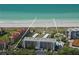 Aerial view of community highlighting proximity to the beach at 8625 Midnight Pass Rd # 305B, Siesta Key, FL 34242