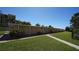 Community storage units near well maintained landscaping at 8625 Midnight Pass Rd # 305B, Siesta Key, FL 34242